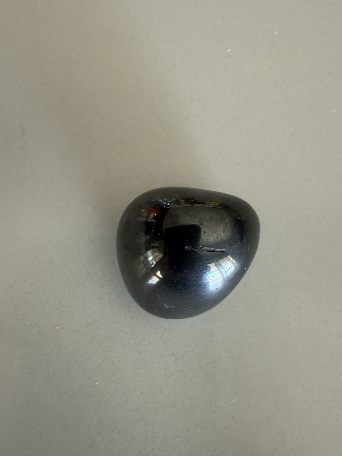 Hematite Tumbled Stone .5″ Brazilian Stone – Shiny – Mirror Properties with Card